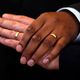 A couple hold hands after their wedding ceremony in Washington, D.C., on March 9, 2010, in Washington, D.C.
Alex Wong/Getty Images